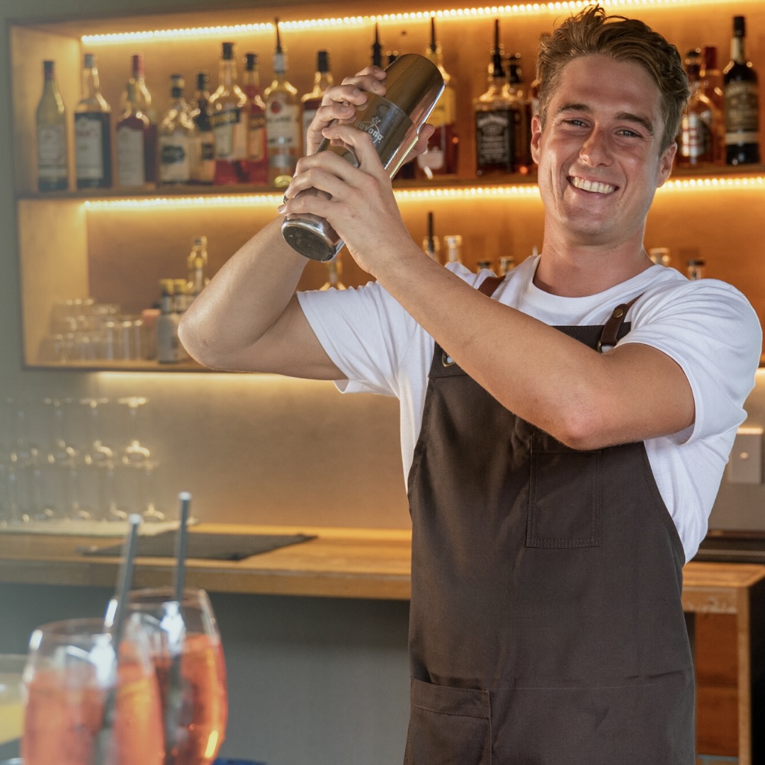 Man shaking cocktail